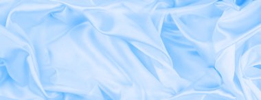 Mavi ipek kumaşlı çizgilerin yakınlaştırılması 