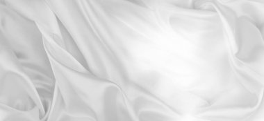 Dalgalanan beyaz ipek kumaş çizgilerinin yakın çekimi