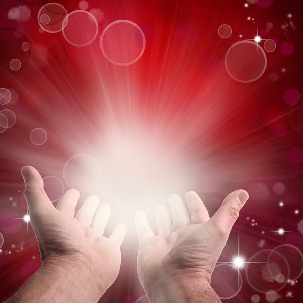 Hands reaching, in front of circles and stars red background