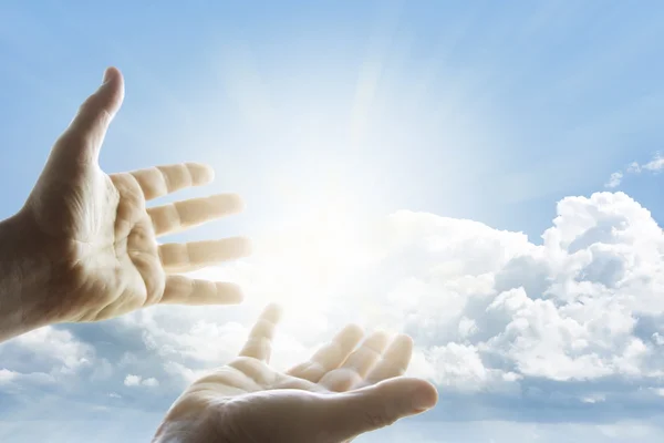 Hands in sky — Stock Photo, Image