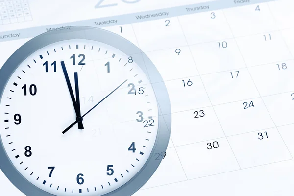 Klok en kalender — Stockfoto