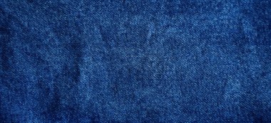 Mavi kot pantolonun yakın plan kumaş dokusu
