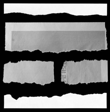 Siyah arka planda beş parça yırtık gazete