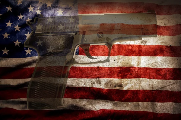 Gun and flag — Stock Photo, Image