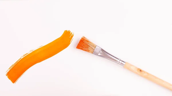 Smear Orange Paint Applied Brush White Background — Stock Photo, Image