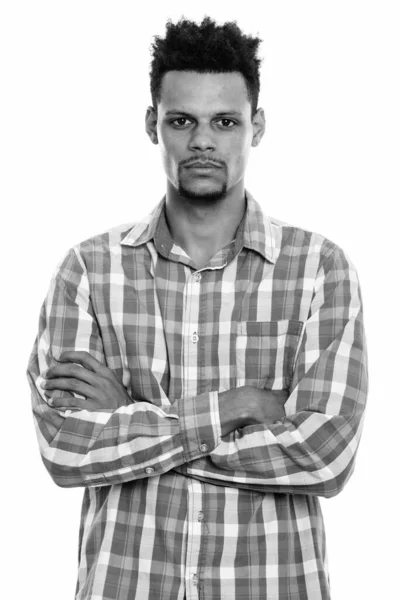 Studio shot of young African man with arms crossed — Stock Photo, Image