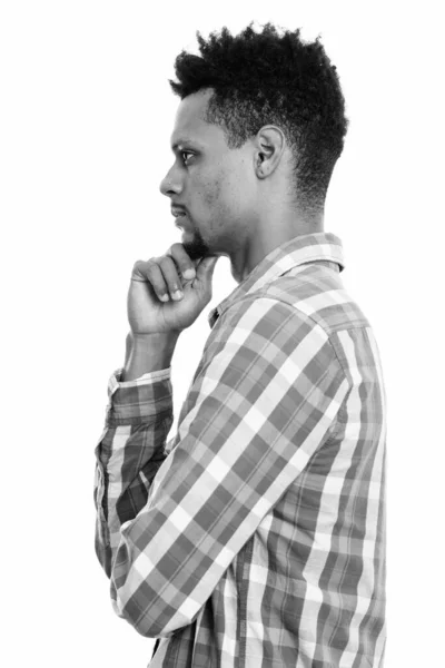 Profile view of young African man thinking — Stock Photo, Image