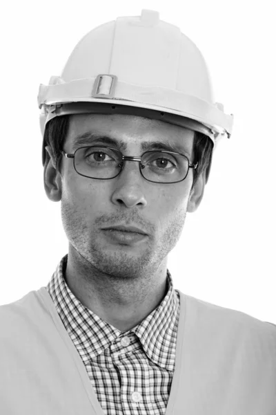 Cara de joven hombre guapo trabajador de la construcción con anteojos —  Fotos de Stock