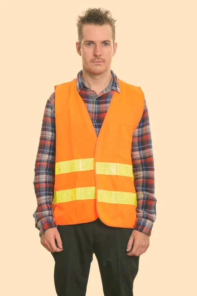 Studio shot of man construction worker standing — Stock Photo, Image