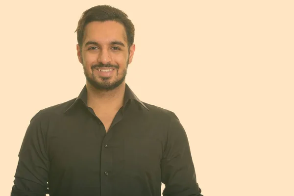 Retrato de feliz jovem bonito barbudo indiano empresário — Fotografia de Stock