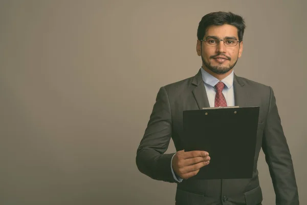 Studio Shot Young Handsome Bearded Persian Businessman Wearing Eyeglasses Gray — Stock Photo, Image