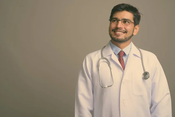 Studio Shot Young Handsome Bearded Persian Man Doctor Wearing Eyeglasses — Stock Photo, Image