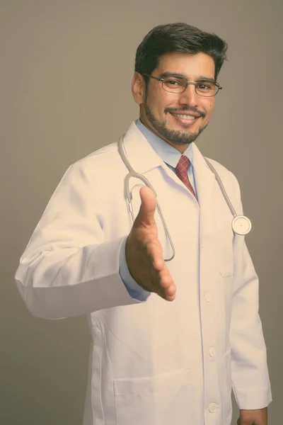 Studio Shot Young Handsome Bearded Persian Man Doctor Wearing Eyeglasses — Stock Photo, Image