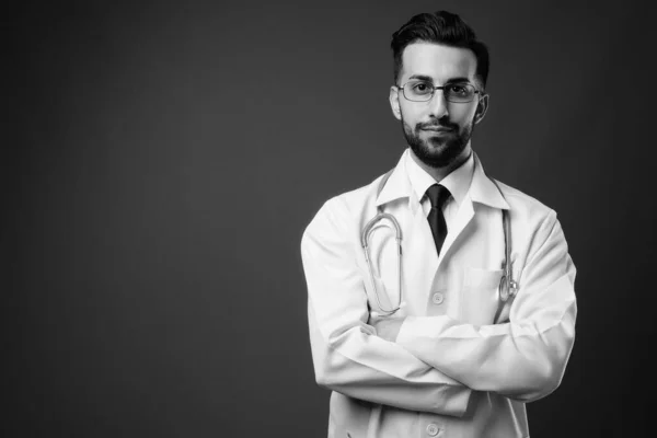Studio Shot Young Handsome Bearded Iranian Man Doctor Brown Background — Stock Photo, Image