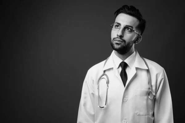 Studio Shot Young Handsome Bearded Iranian Man Doctor Brown Background — Stock Photo, Image