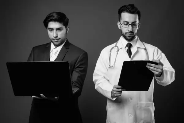 Studio Shot Young Iranian Businessman Young Iranian Man Doctor Together — Stock Photo, Image