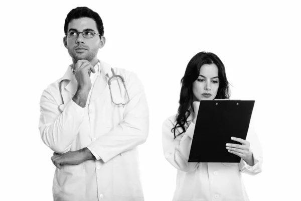 Studio Shot Young Man Woman Doctor Thinking Woman Doctor Reading — Stock Photo, Image