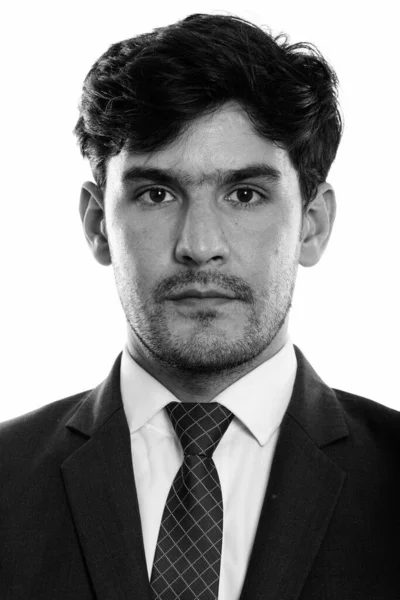 Gesicht eines jungen persischen Geschäftsmannes in Schwarz-Weiß erschossen — Stockfoto