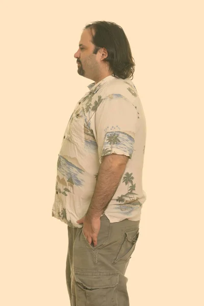 Profile view of fat Caucasian man ready for vacation — Stock Photo, Image