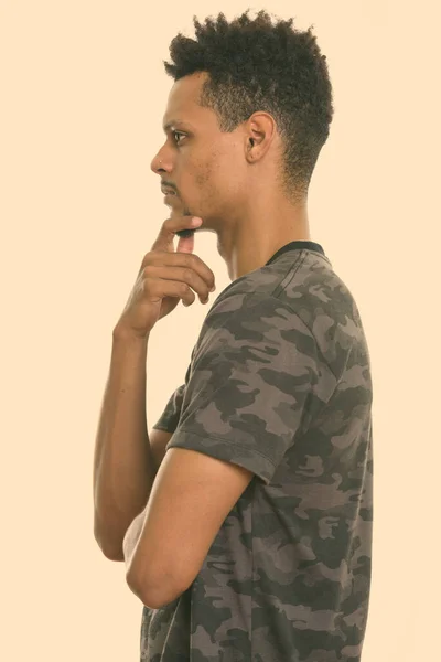 Profile view of young African man thinking — Stock Photo, Image