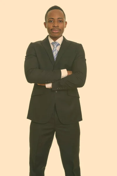 Young African businessman with arms crossed — Stock Photo, Image