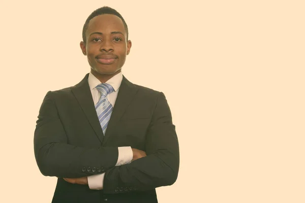 Joven empresario africano con los brazos cruzados Imágenes de stock libres de derechos