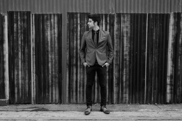 Young handsome Persian businessman in the streets outdoors — Stock Photo, Image