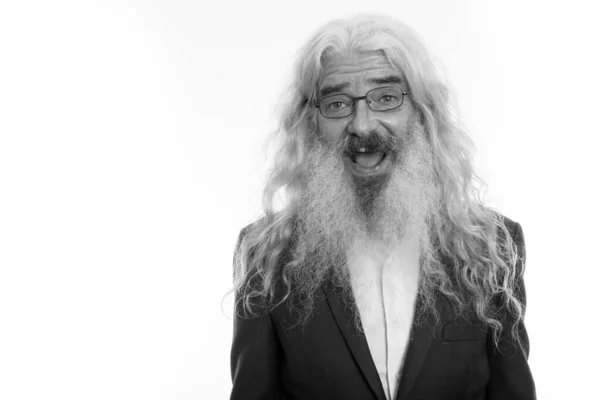 Studio shot of happy senior bearded businessman smiling while wearing eyeglasses — Stock Photo, Image