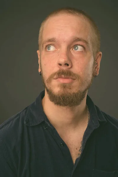 Portrait of Finnish man against gray background — Stock Photo, Image