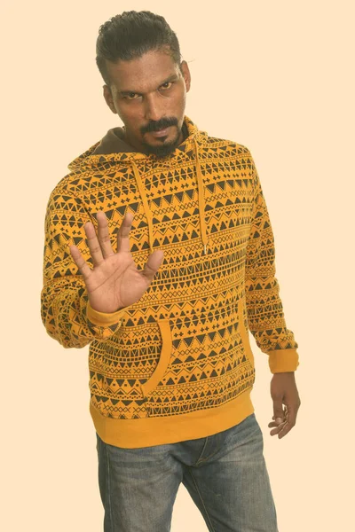 Young Indian man with stop hand gesture — Stock Photo, Image