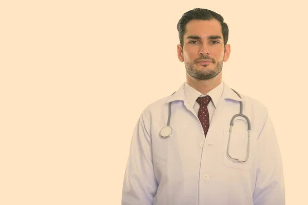 Estúdio tiro de jovem bonito homem médico — Fotografia de Stock