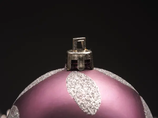 Christmas bauble on a dark background — Stock Photo, Image