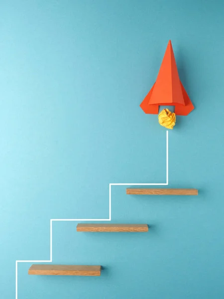 Orange Rocket Starship Climbing Stairs Blue Background Success Creativity Concept — Stock Photo, Image