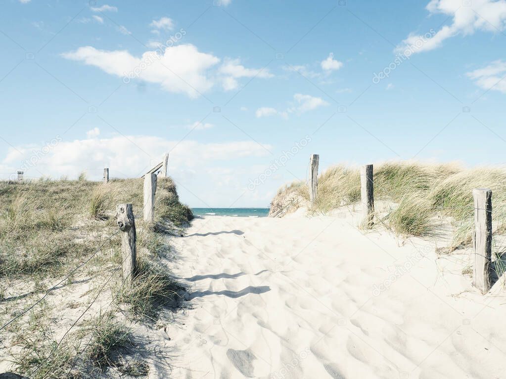 Beautiful pathway to the beach on a sunny winter day, Baltic Sea