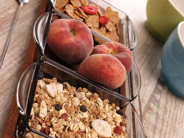 Muesli on a wooden table — Stock Photo, Image