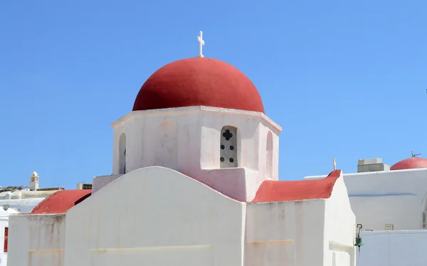 A white church with red roof on Mykonos island, Greece Stock Photo