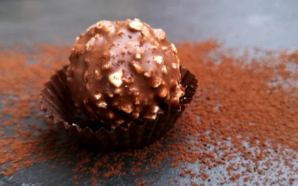 Delicious Chocolate Candy Ball Filling Nuts Dark Background — Stok Foto