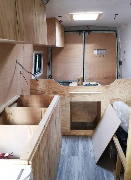 Interior view of a conversion van into a camper van