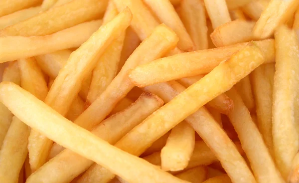 Pommes frites bakgrund — Stockfoto