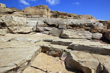 Arka plan ile Thassos kayalarda