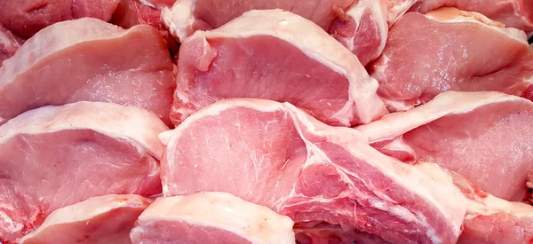 Pedaços de carne crua fresca — Fotografia de Stock