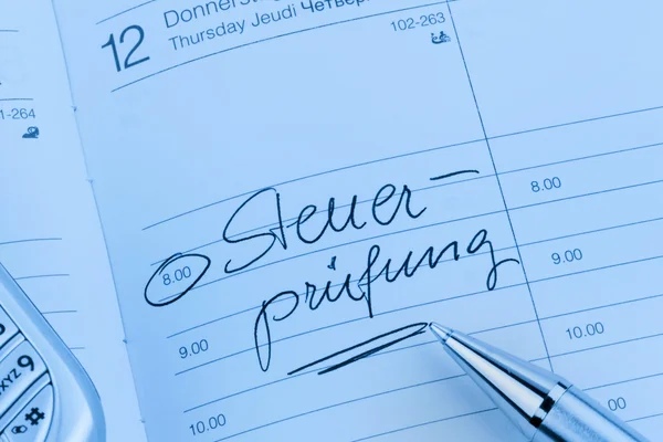 Entry in the calendar: tax audit — Stock Photo, Image