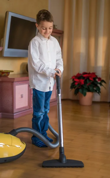Child with vacuum cleaner — Stock Photo, Image