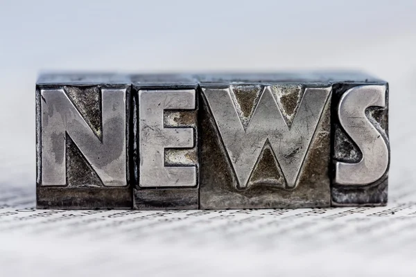 News in lead letters — Stock Photo, Image