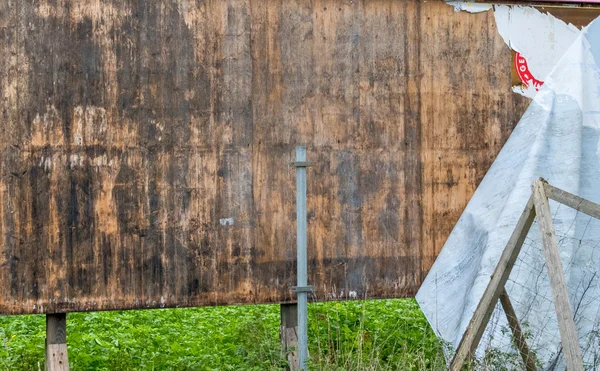 Alte Werbetafel aus Holz — Stockfoto