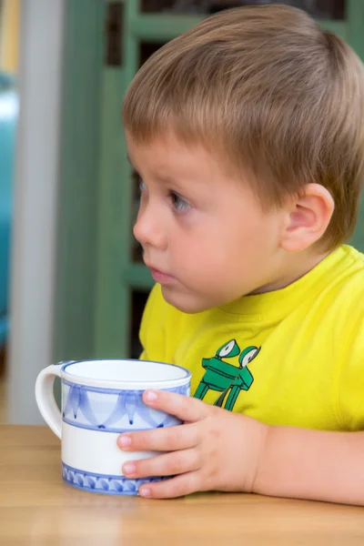 Child with cup — Stock Photo, Image