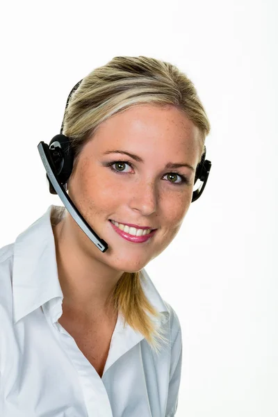 Mulher com fone de ouvido no atendimento ao cliente — Fotografia de Stock