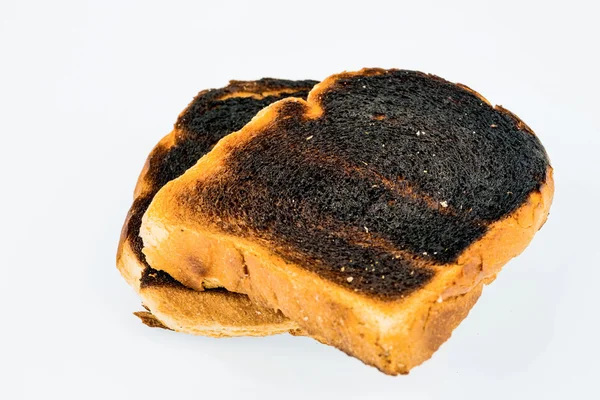 Burned toast bread slices — Stock Photo, Image