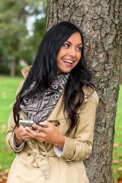 Woman writes sms — Stock Photo, Image