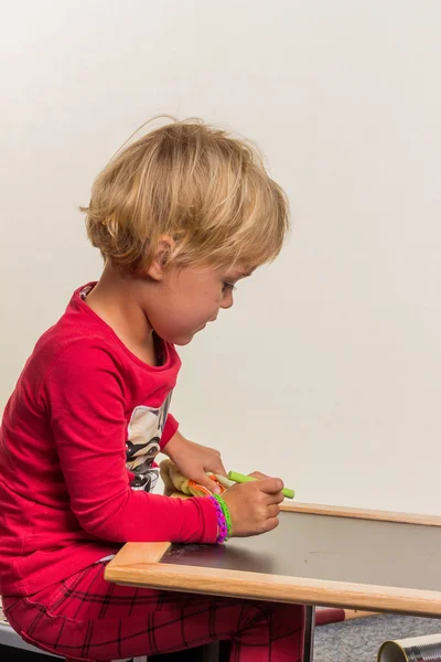 Schoolboy with school board — Stock Photo, Image